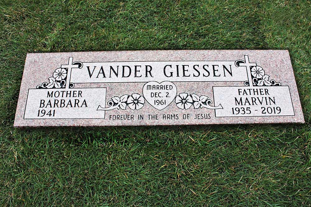 Rose colored companion marker with cross, flowers, heart, and marriage date