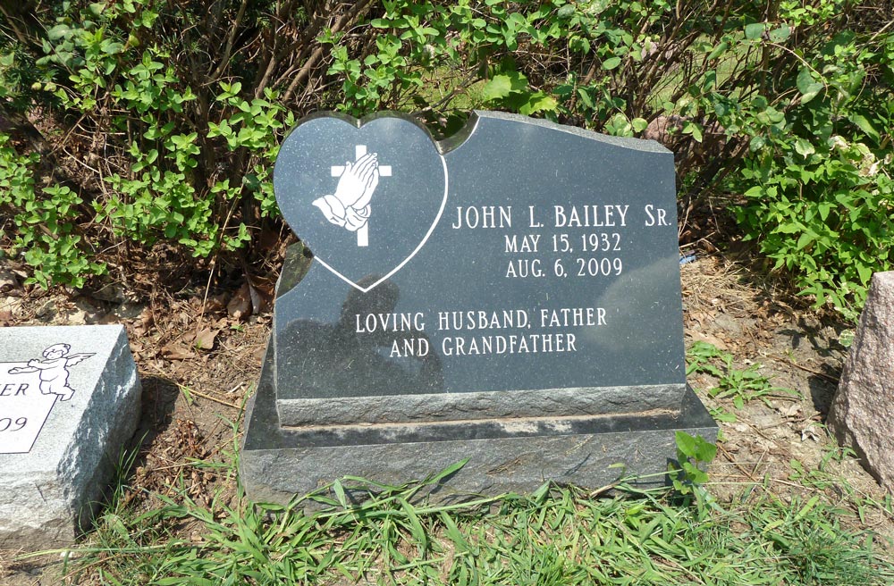 Black granite offset heart slant with praying hands and cross